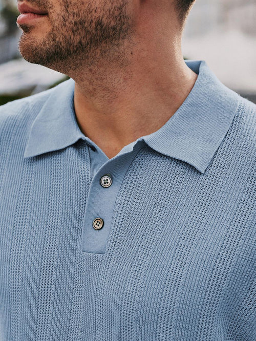 Knitted jacquard polo lichtblauw