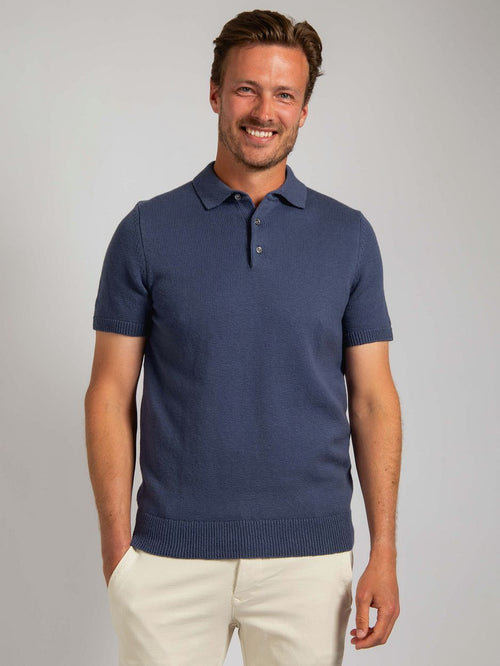 Heavy knitted polo raw denim blauw