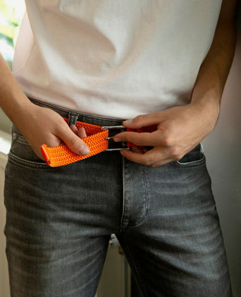 Suitable geweven riem oranje