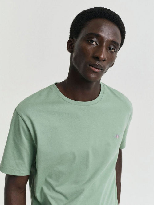 T-shirt shield logo groen