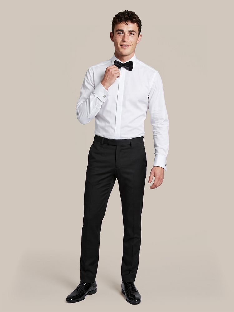 Strik zwart met bretel zwart, rokkostuum broek hudson zwart, kniekousen zwart en vernice lakschoen zwart