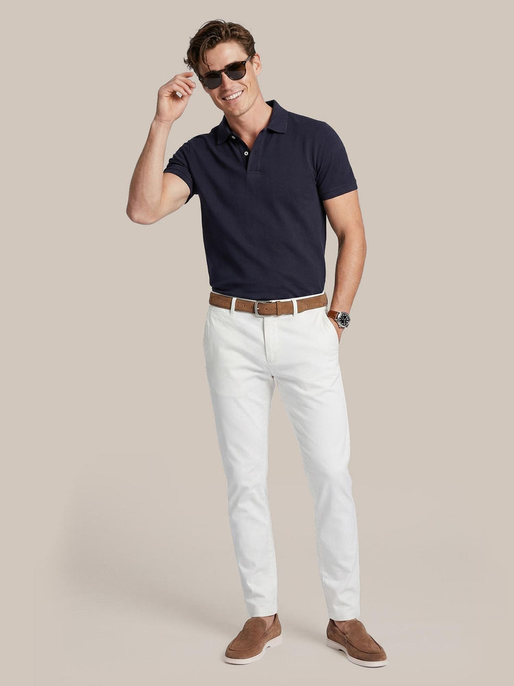 Polo piqué donkerblauw met Riem suède leer cognac