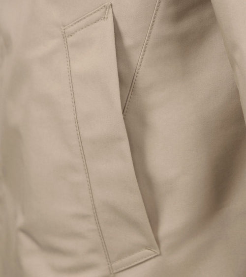 Suitable regenjas beige